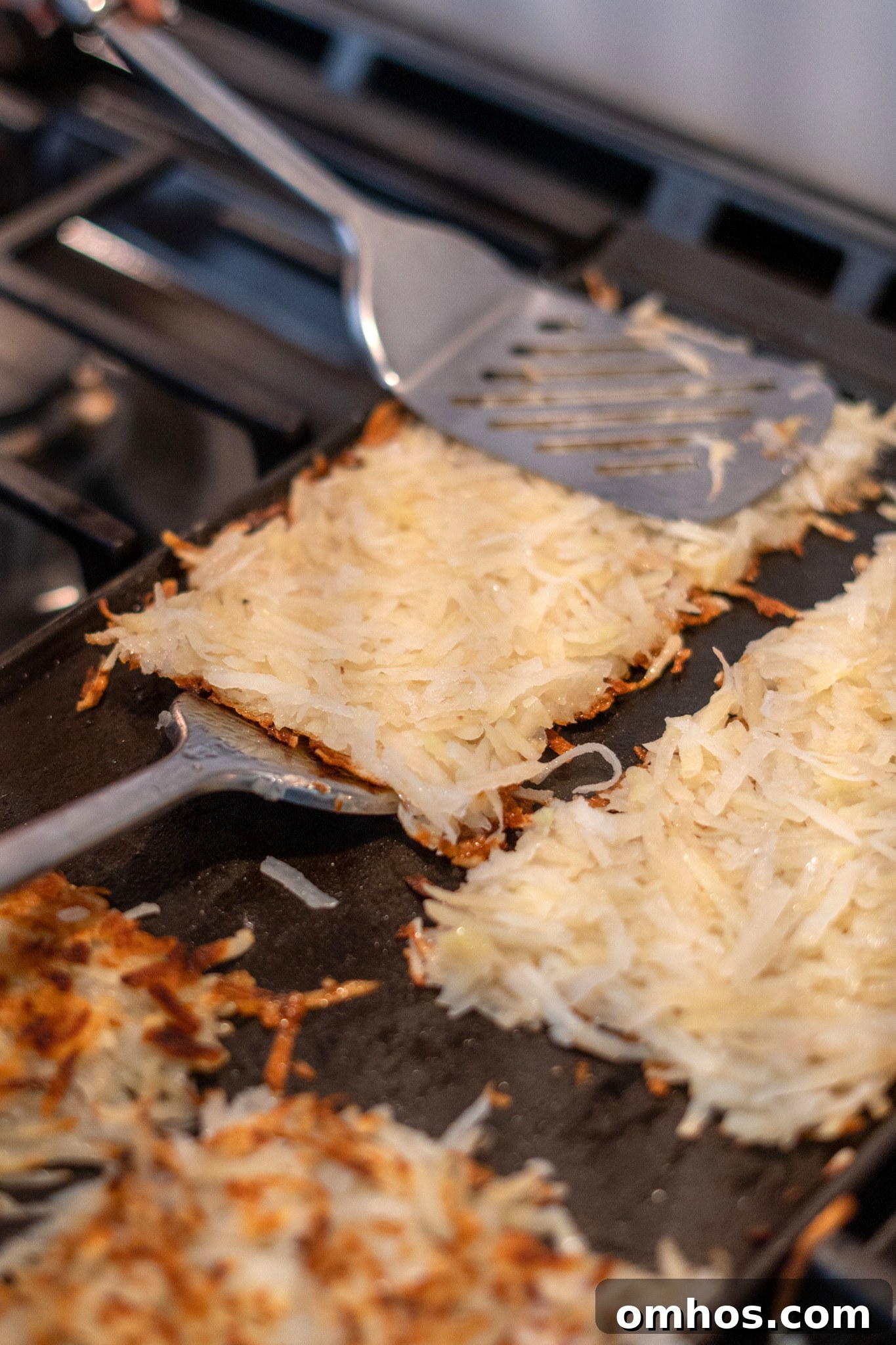 Homemade Crispy Hash Browns Recipe 11 Flipping hash browns