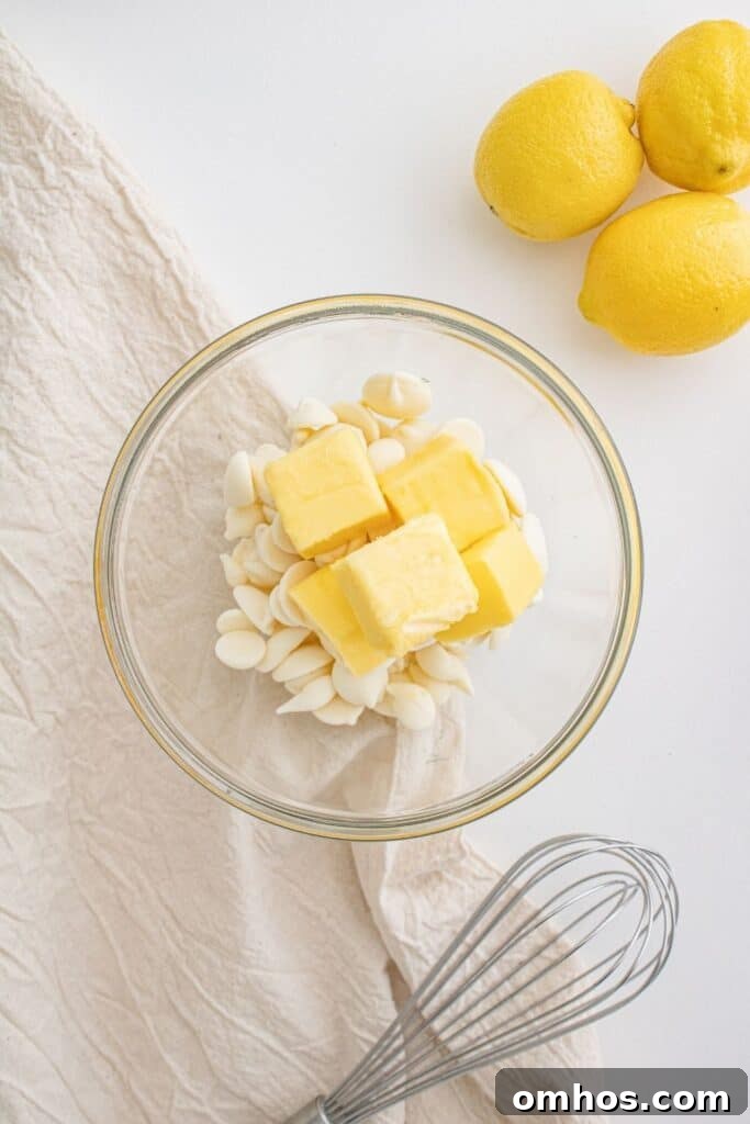 Molten Lemon Lava Cake Recipe 3 white chocolate chips and butter in bowl with whisk by it