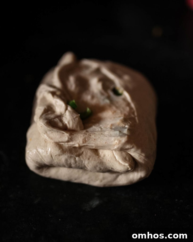 Sourdough Discard Loaf with Cornmeal, Cheddar and Jalapeno Recipe 5 Lamination - second fold