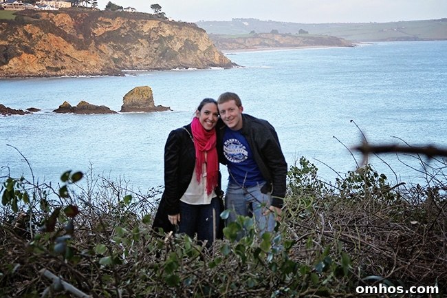 Couple photographed using a tripod made of sticks and rocks