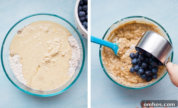 Moist Blueberry Oatmeal Muffins Recipe 7 pouring blueberries into muffin batter