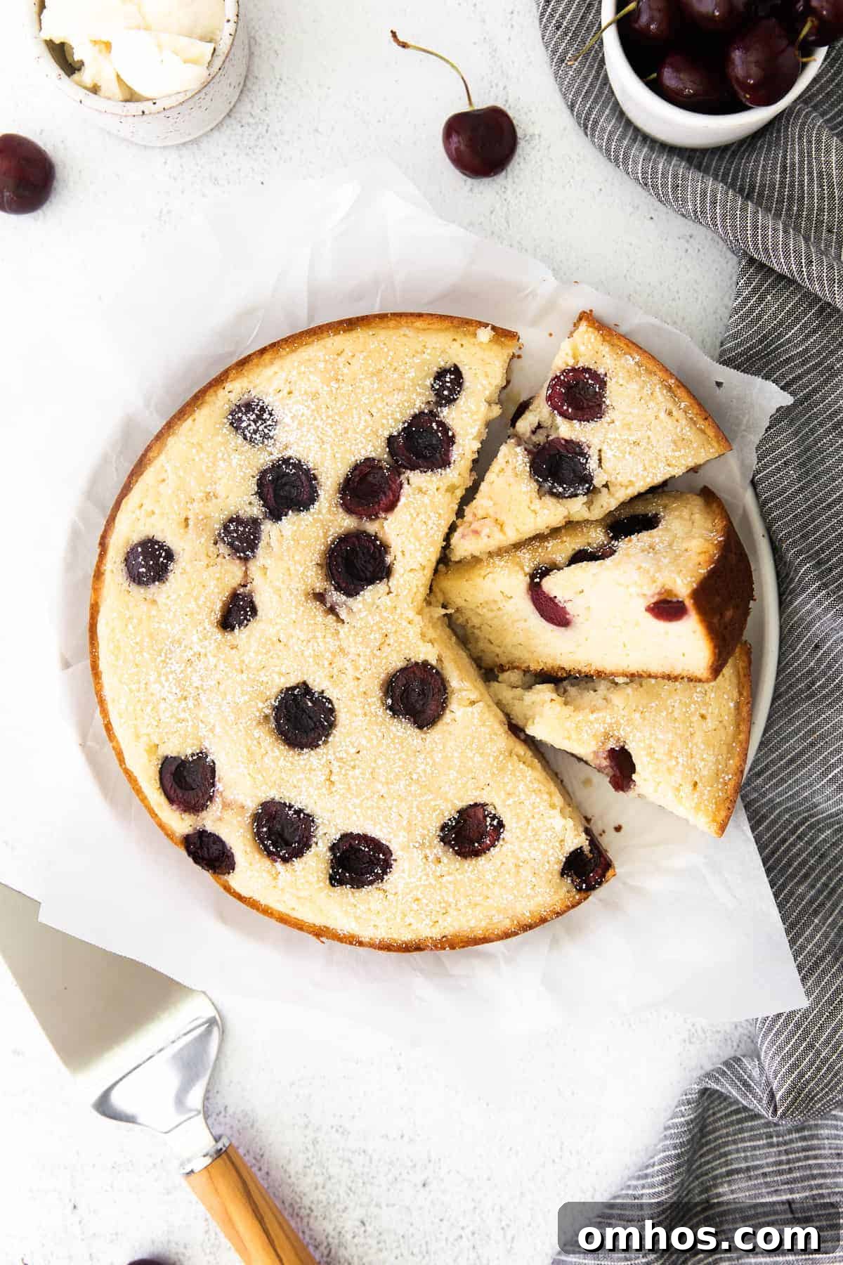 Cut up cherry ricotta cake.