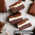Chocolate mint brownies on parchment paper.