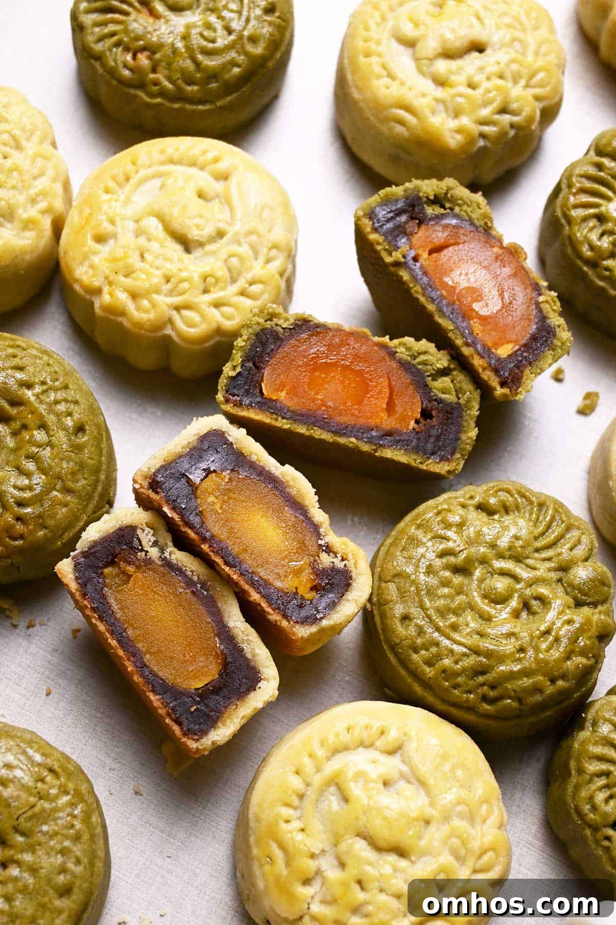 cookie crust mooncakes with red bean paste and salted egg yolk filling
