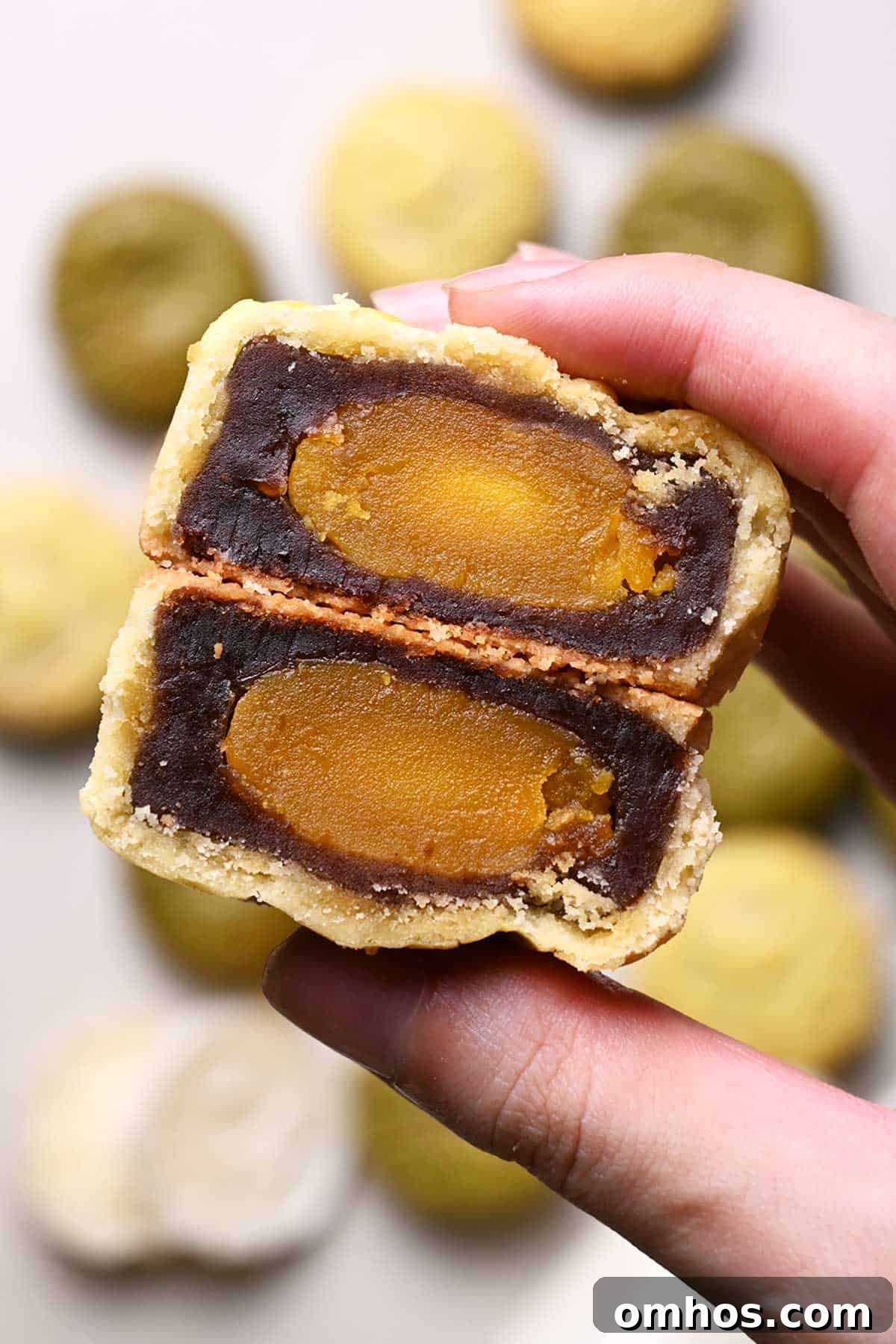 cookie crust mooncakes with red bean paste and salted egg yolk filling