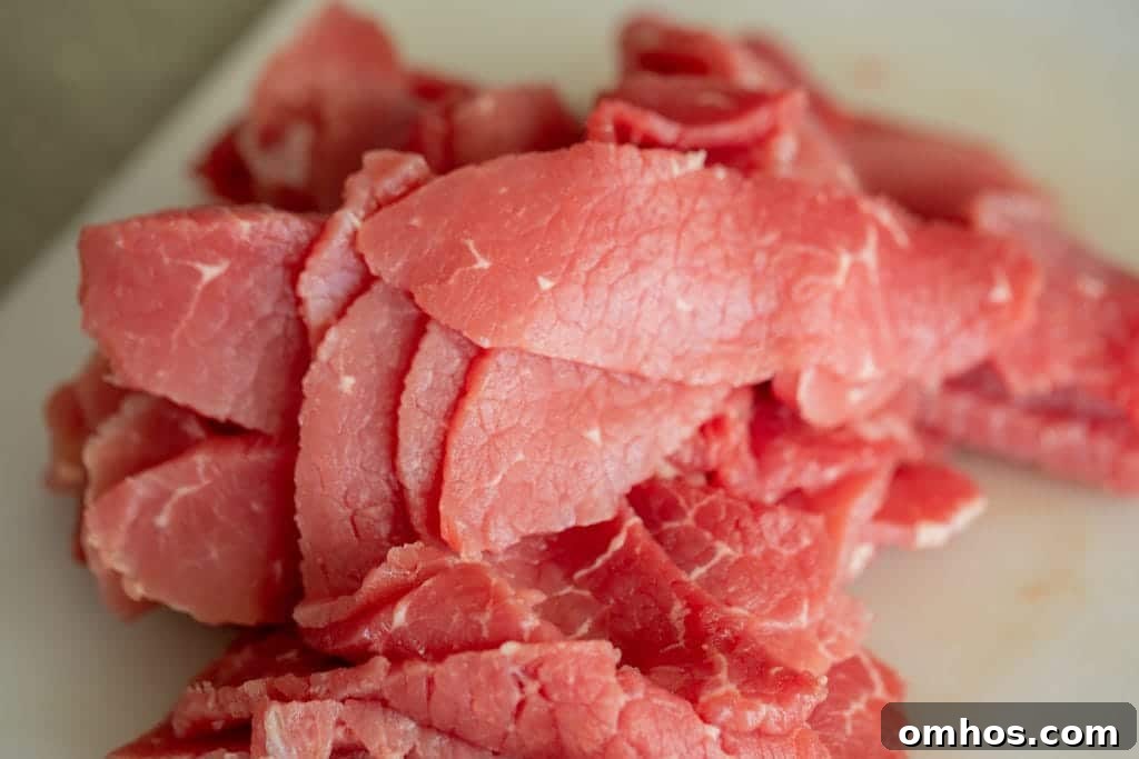 corned beef slices on a cutting board.