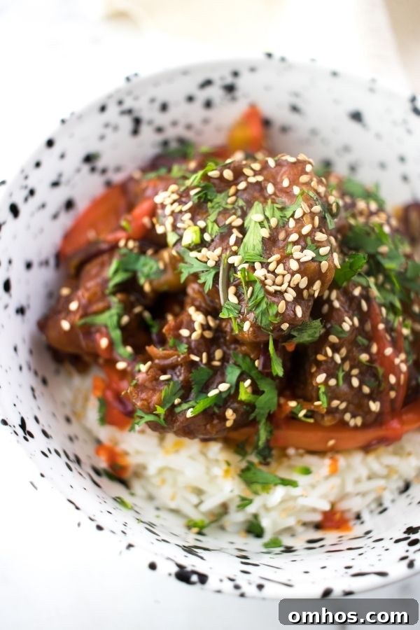 Sweet and Sour Pork Kou Lou Yuk gu lou yok or 咕噜肉 in a bowl with rice