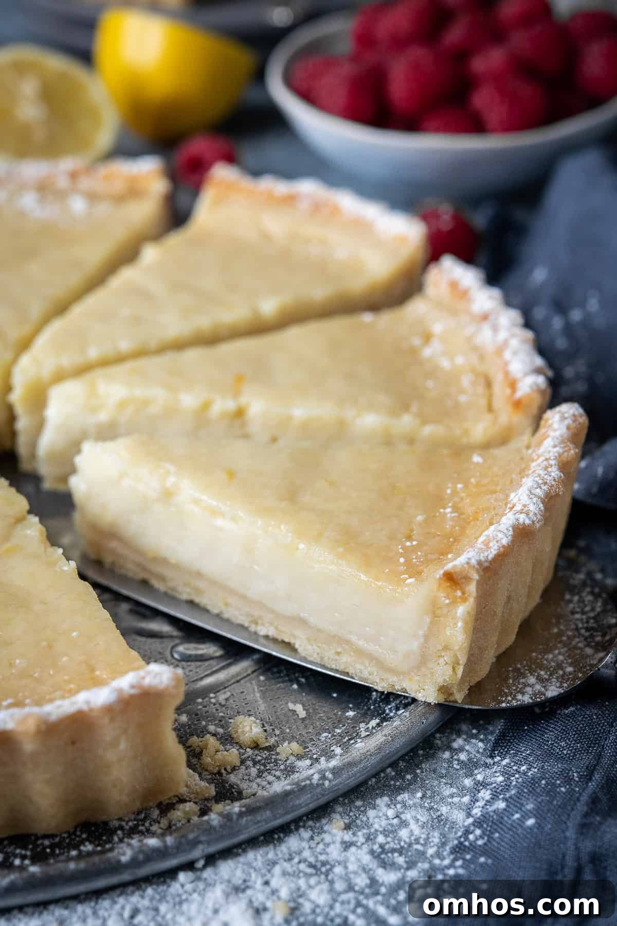 Slice of vegan lemon tart Close up of a slice of vegan lemon tart