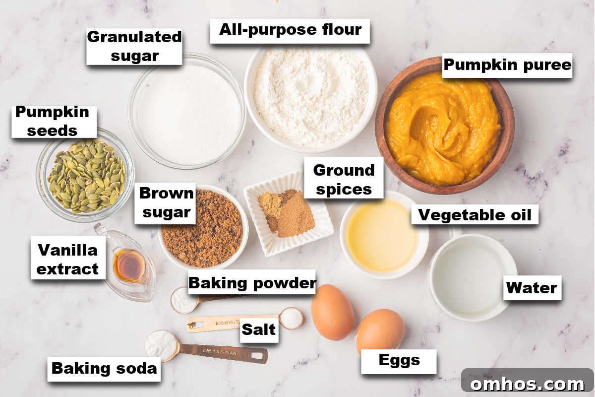 Starbucks-Style Pumpkin Bread Recipe 4 A top view of ingredients for bread arranged on a marble countertop.