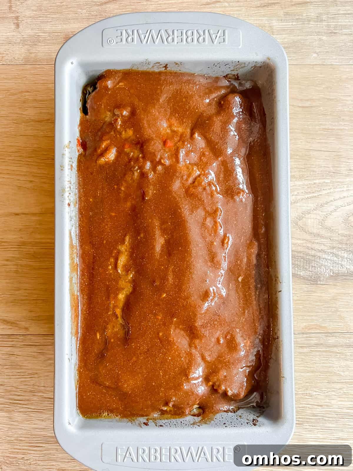 Flavorful Paleo Meatloaf Recipe: Dairy Free, Gluten Free 9 Paleo meatloaf with meatloaf sauce on top.