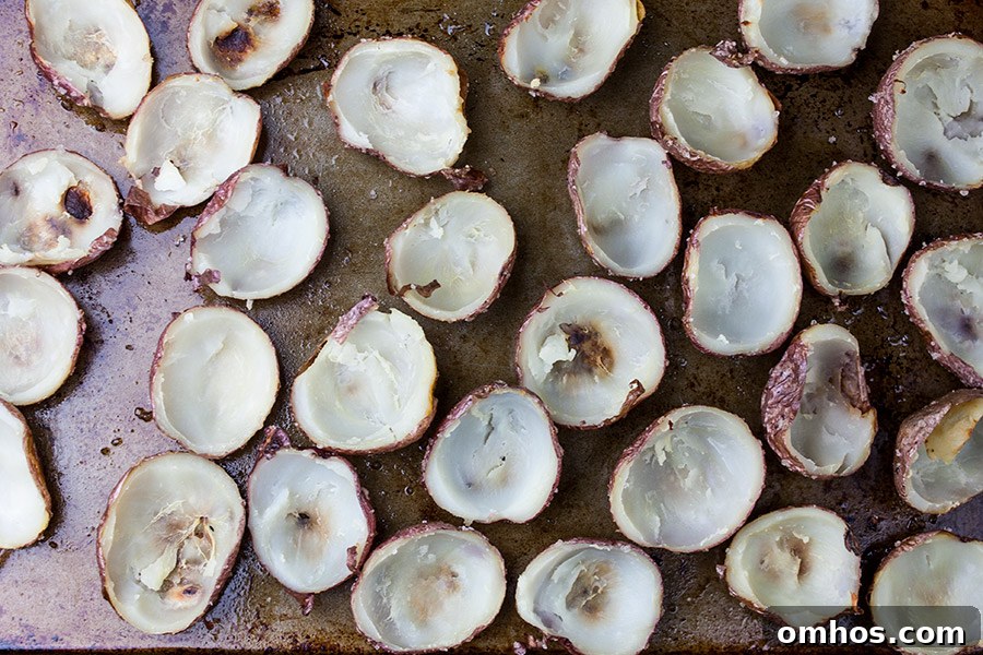 Deviled Potato Bites Recipe: Crispy Mini Appetizers 2 Deviled Potato Bites - potato skins scooped out on a baking sheet