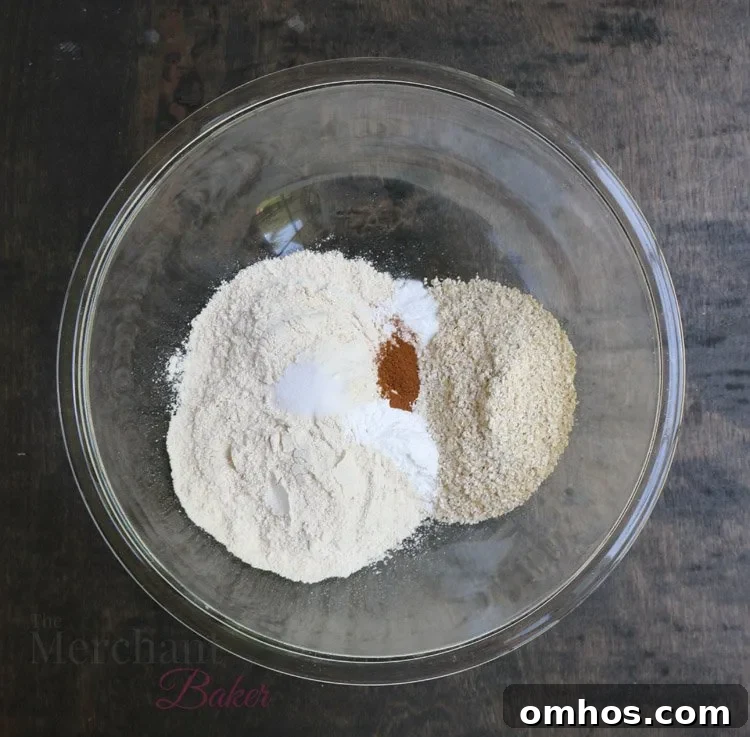 Glass bowl filled with dry pancake ingredients