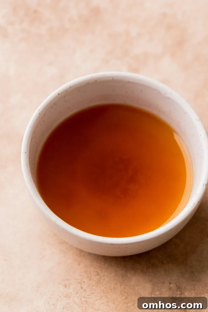 Reduced apple cider in a bowl.
