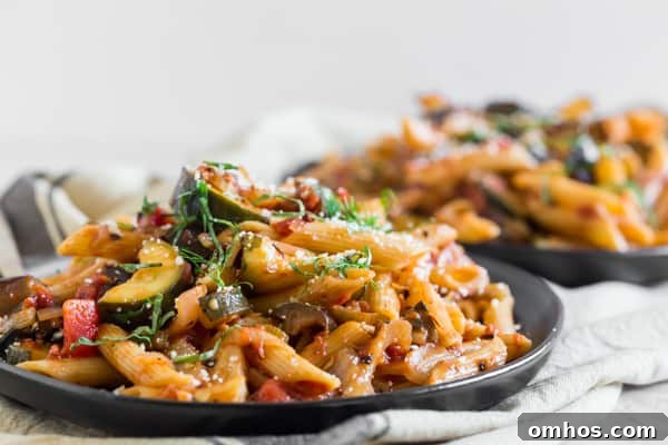 Ratatouille Pasta on a plate with basil. 