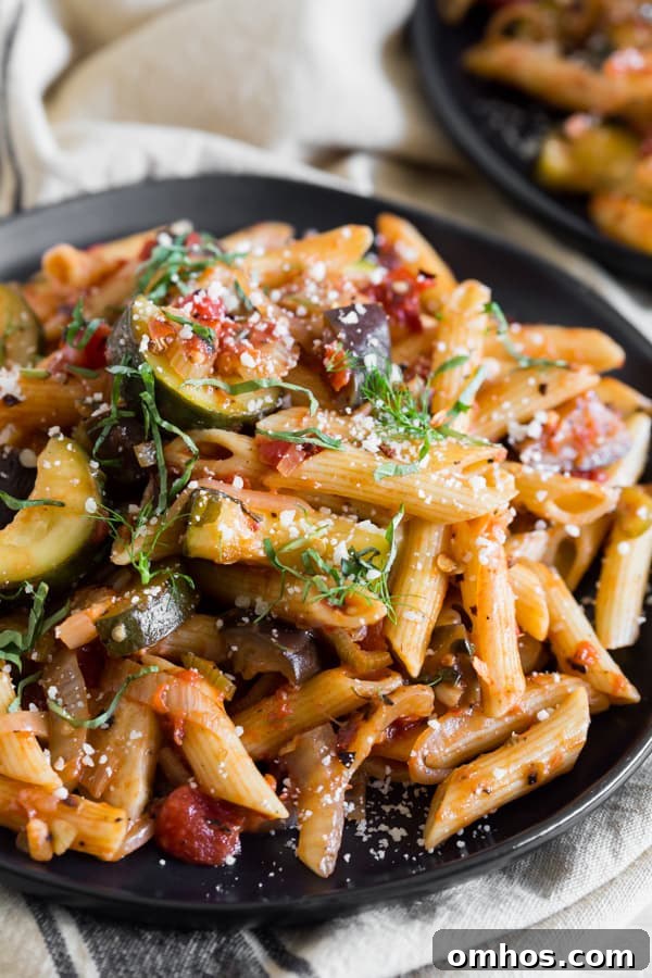 Ratatouille Pasta garnished with basil. 