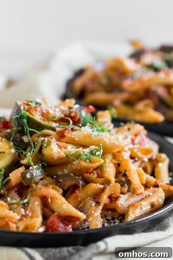 Ratatouille Pasta sprinkled with Parmesan cheese. 