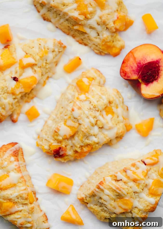 baked peach scones next to sliced and cubed peaches