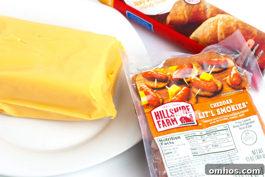 Cheesy Pigs in a Blanket Recipe: Cheese-Stuffed Sausage Bites 5 cheesy pigs in a blanket