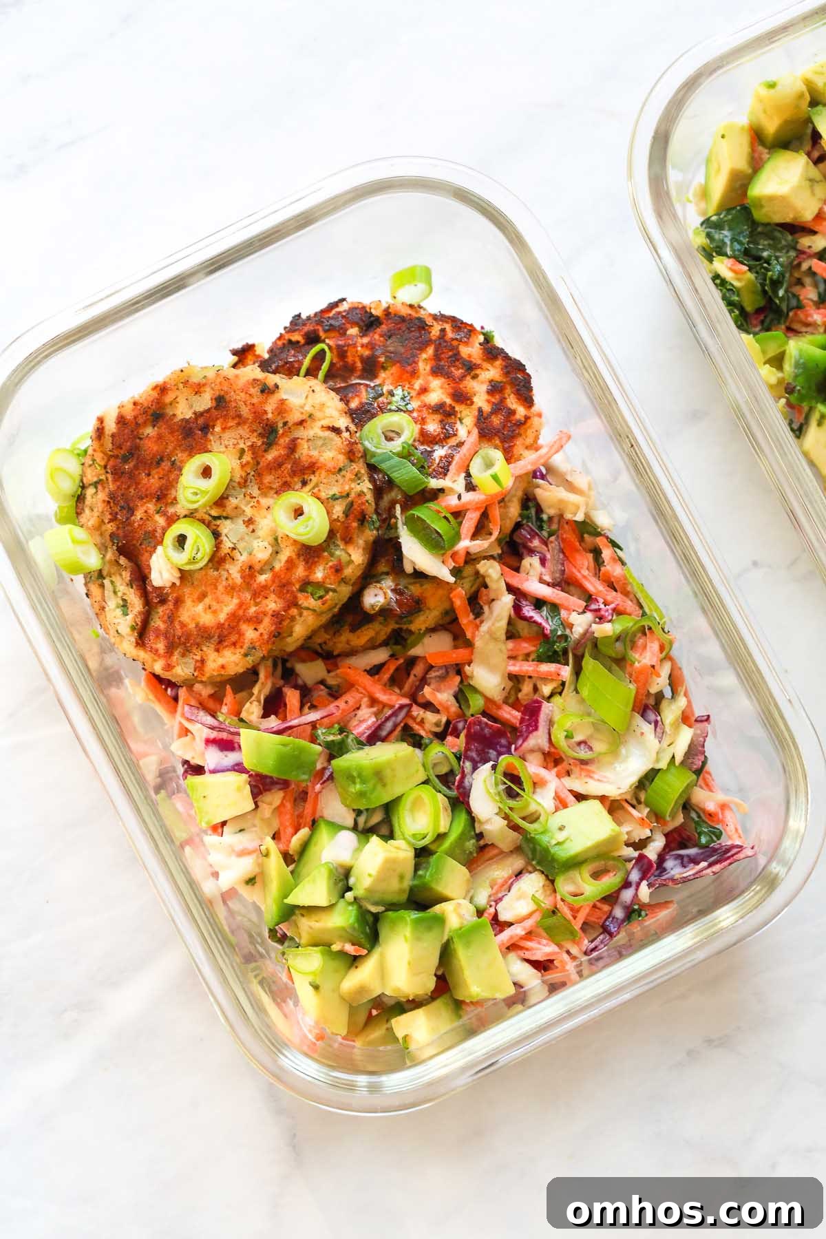 Salmon with coleslaw salad meal prep.