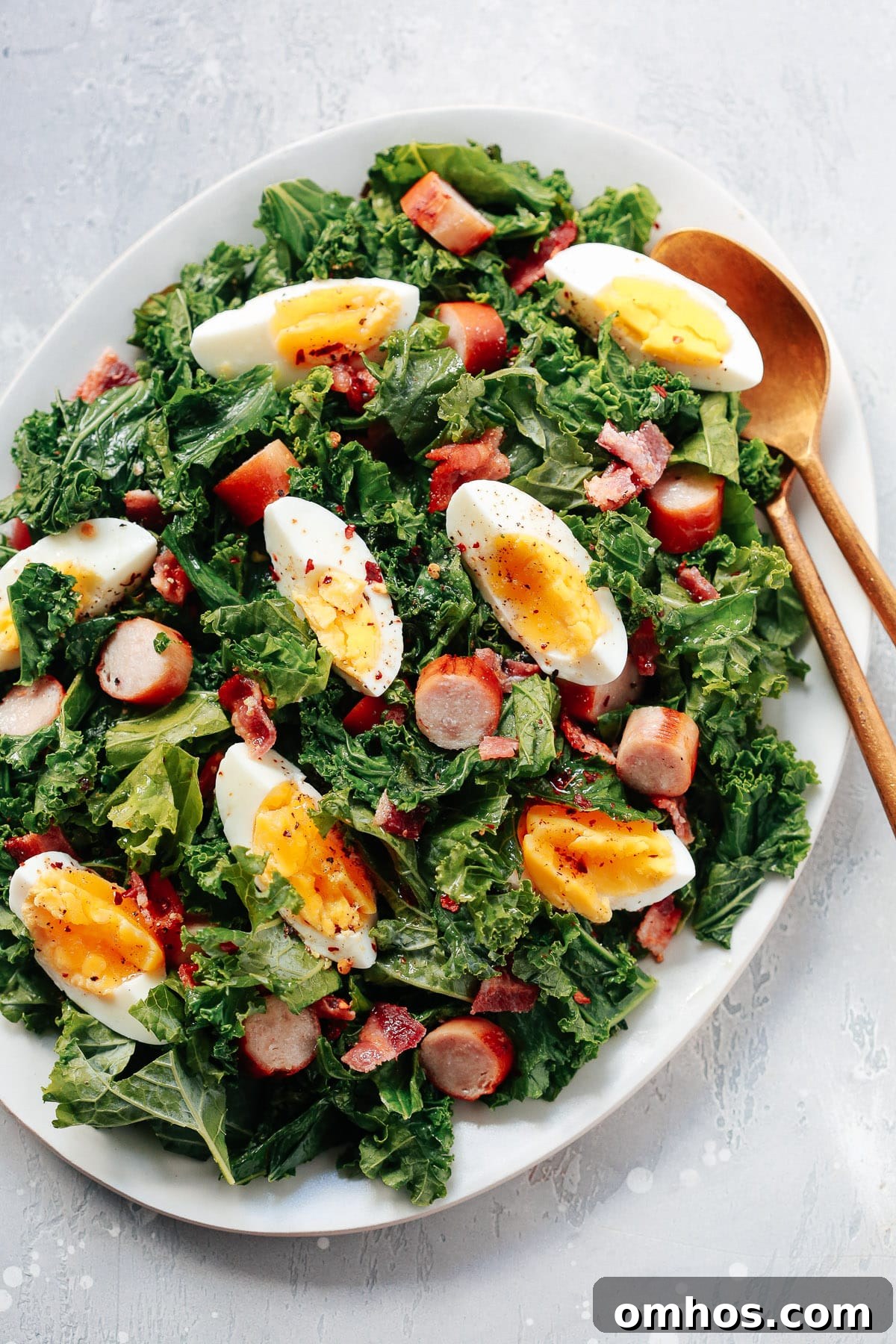 overhead view of Breakfast salad plate with two spoons inside