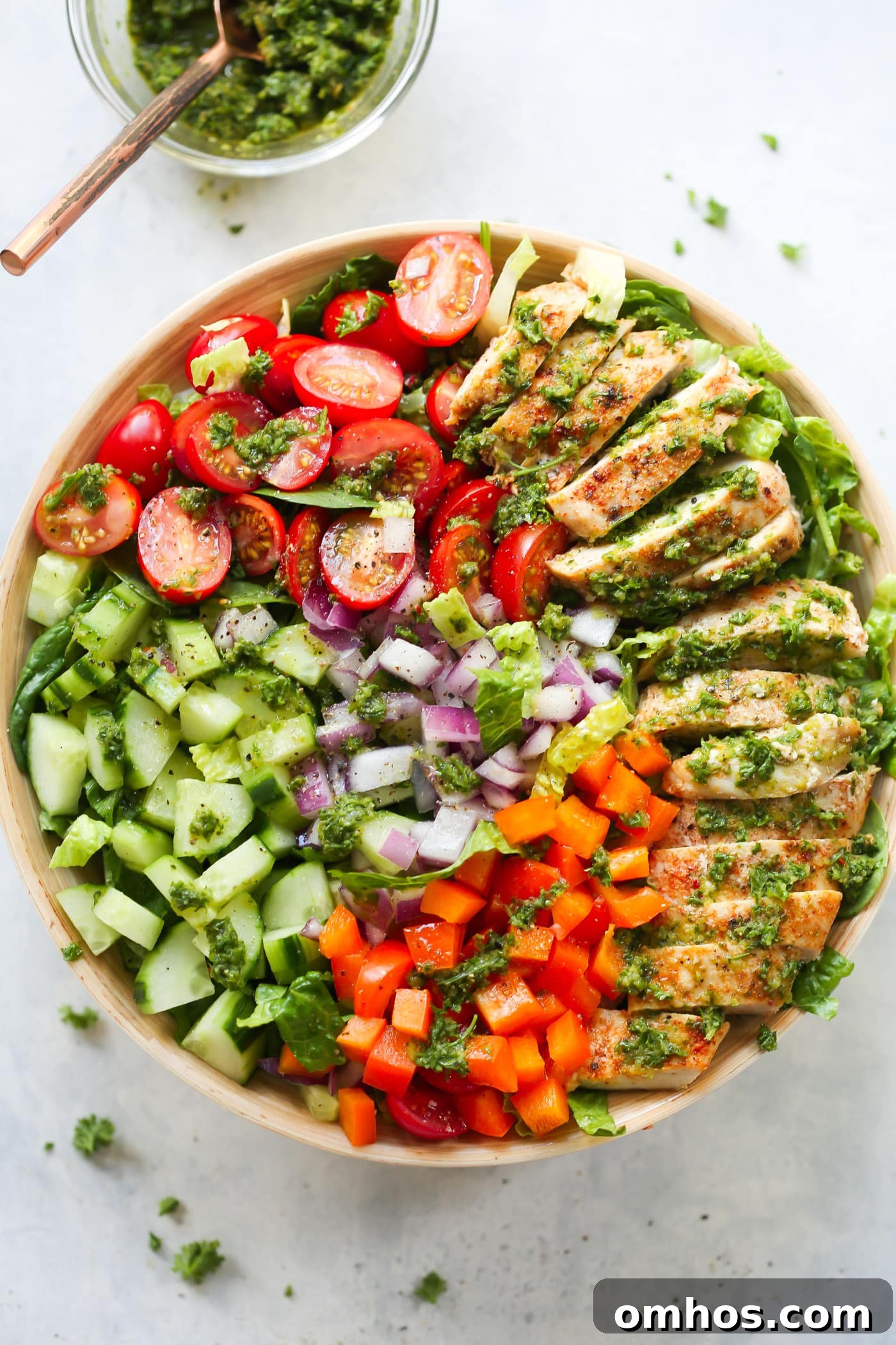 overhead view of a chimichurri chicken chopped Salad bowl 