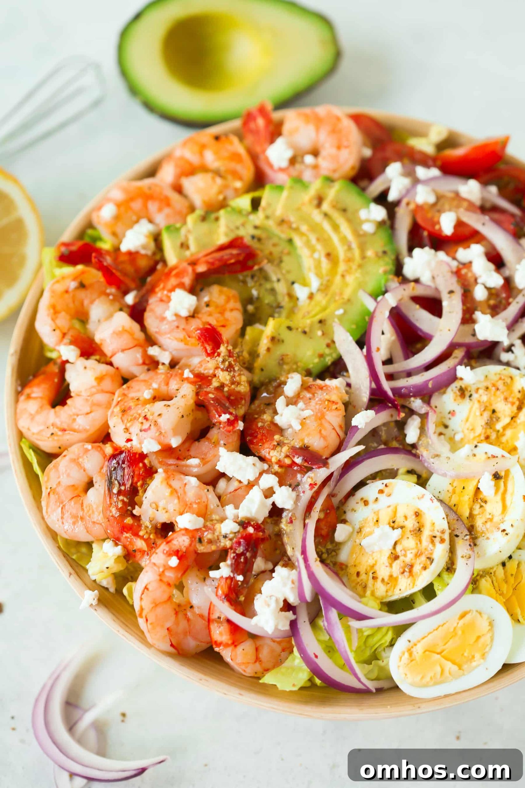 overhead view of a bowl of shrimp and avocado salad 