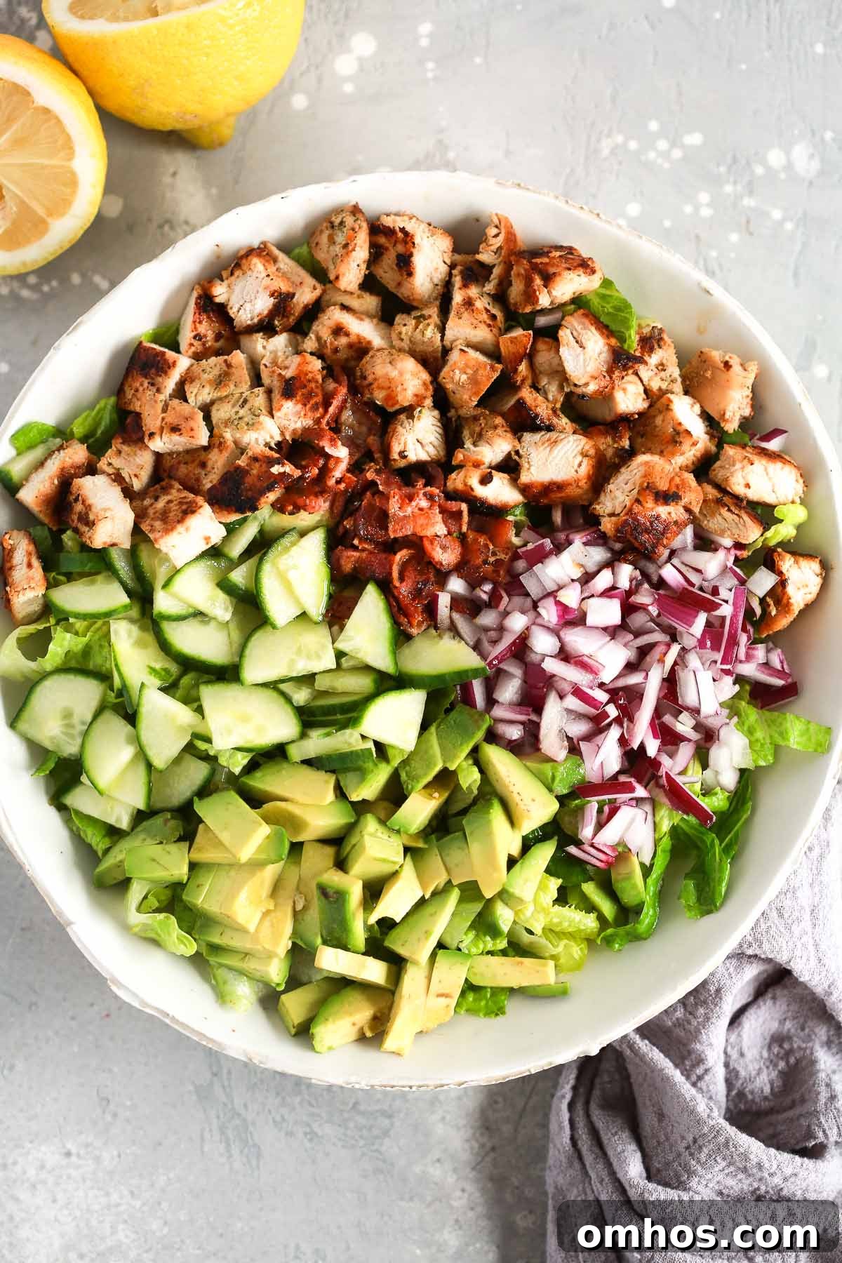 A white bowl of chopped chicken salad.