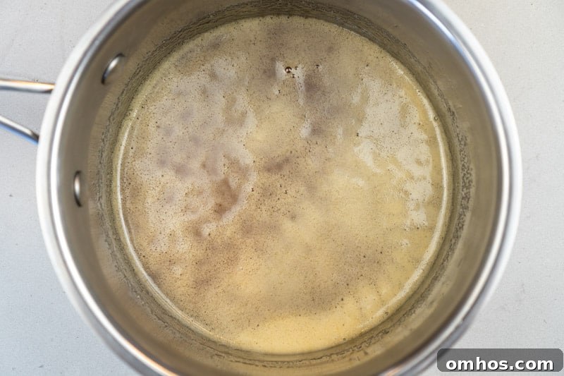 Dissolving the honey, maple syrup and sugar