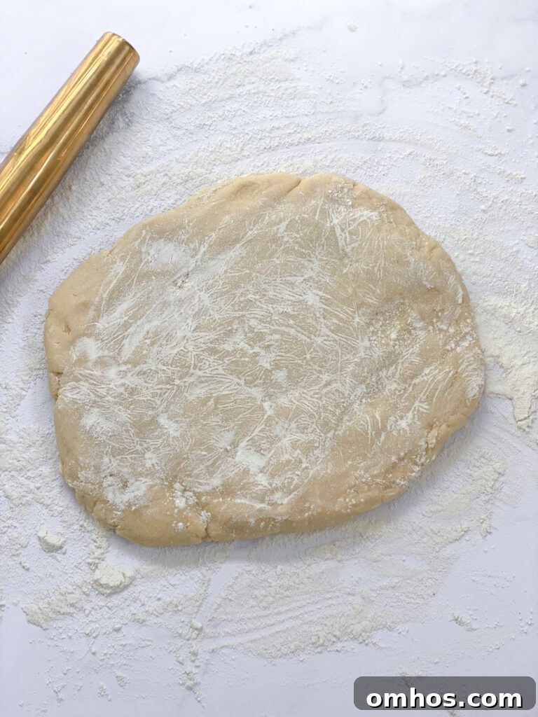 How to Make a Flaky, Buttery Pie Crust 8 dough floured and rolling out