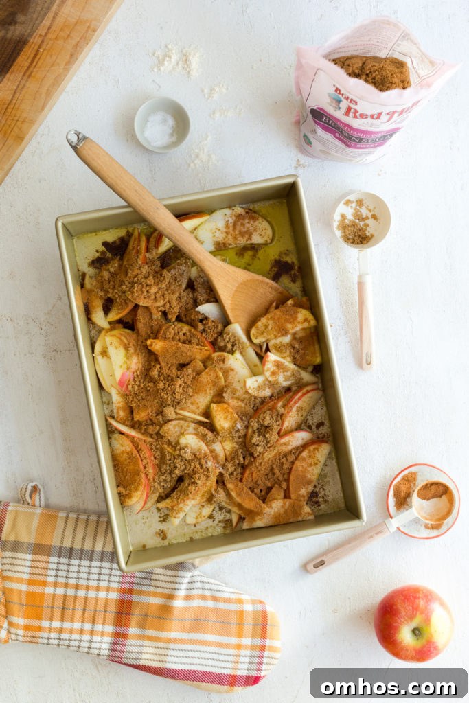 Hootenanny Apple-Bottom Pancake Recipe 5 Tossing apples with butter, brown sugar & cinnamon
