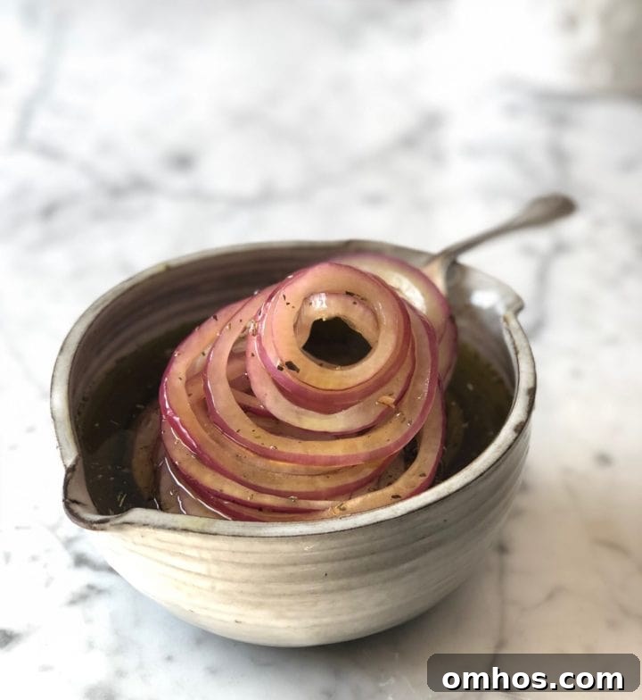Wedge Inspired Baked Potato Salad Recipe 5 Marinated Onions in a white bowl