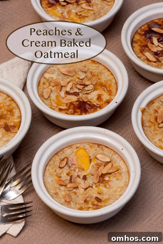 white ramekins full of peach oatmeal topped with almonds, some forks off to the left side.