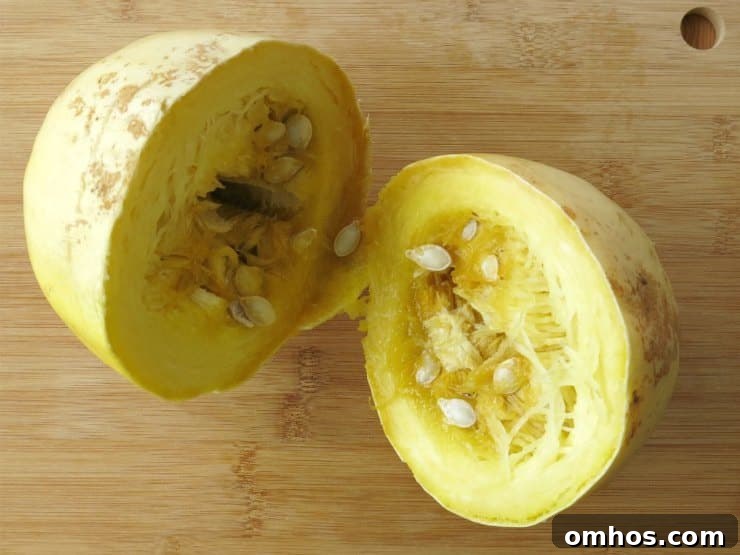 How to Cook Whole Spaghetti Squash in Slow Cooker or Oven 6 Spaghetti Squash cut in half crosswise.