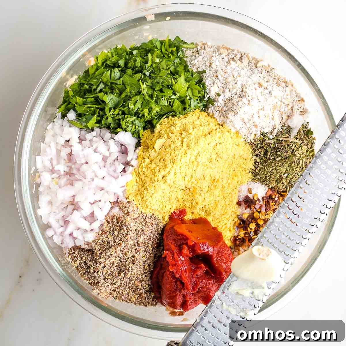 Mashed beans plus nutritional yeast, parsley, ground flax, seasoning and grated garlic.