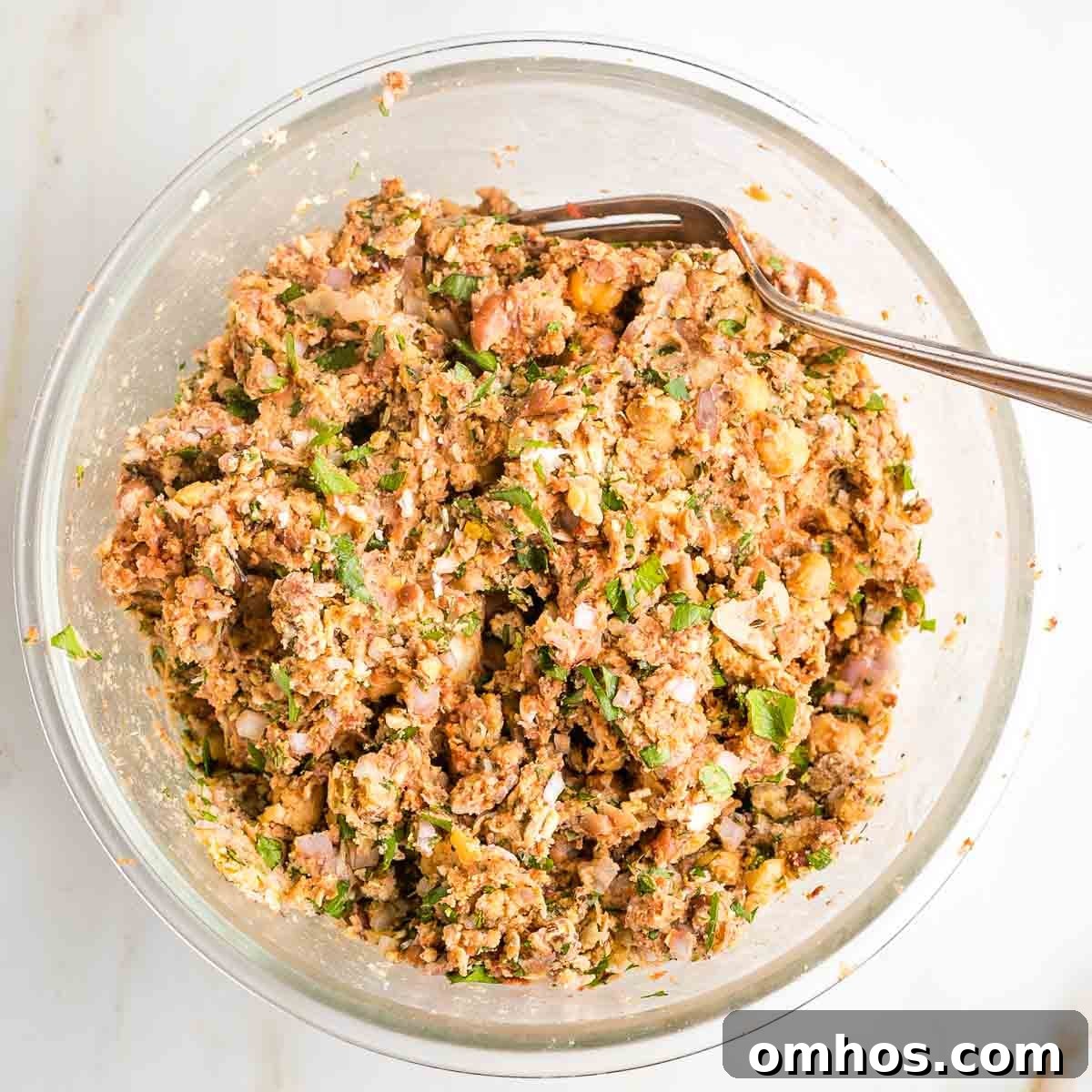 Mashed beans and spices form the batter to vegan meatballs.