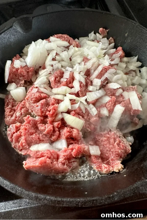 Crock Pot Taco Soup Recipe for Weeknight Family Dinners 3 ground beef and onion in skillet