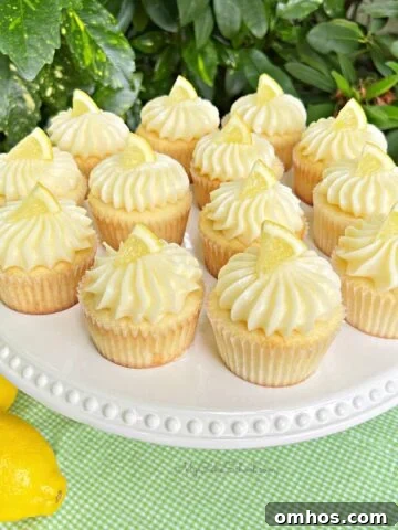 Moist Limoncello Bundt Cake with Lemon Glaze 7 Lemon Cupcakes with Lemon Cream Cheese Frosting on white pedestal