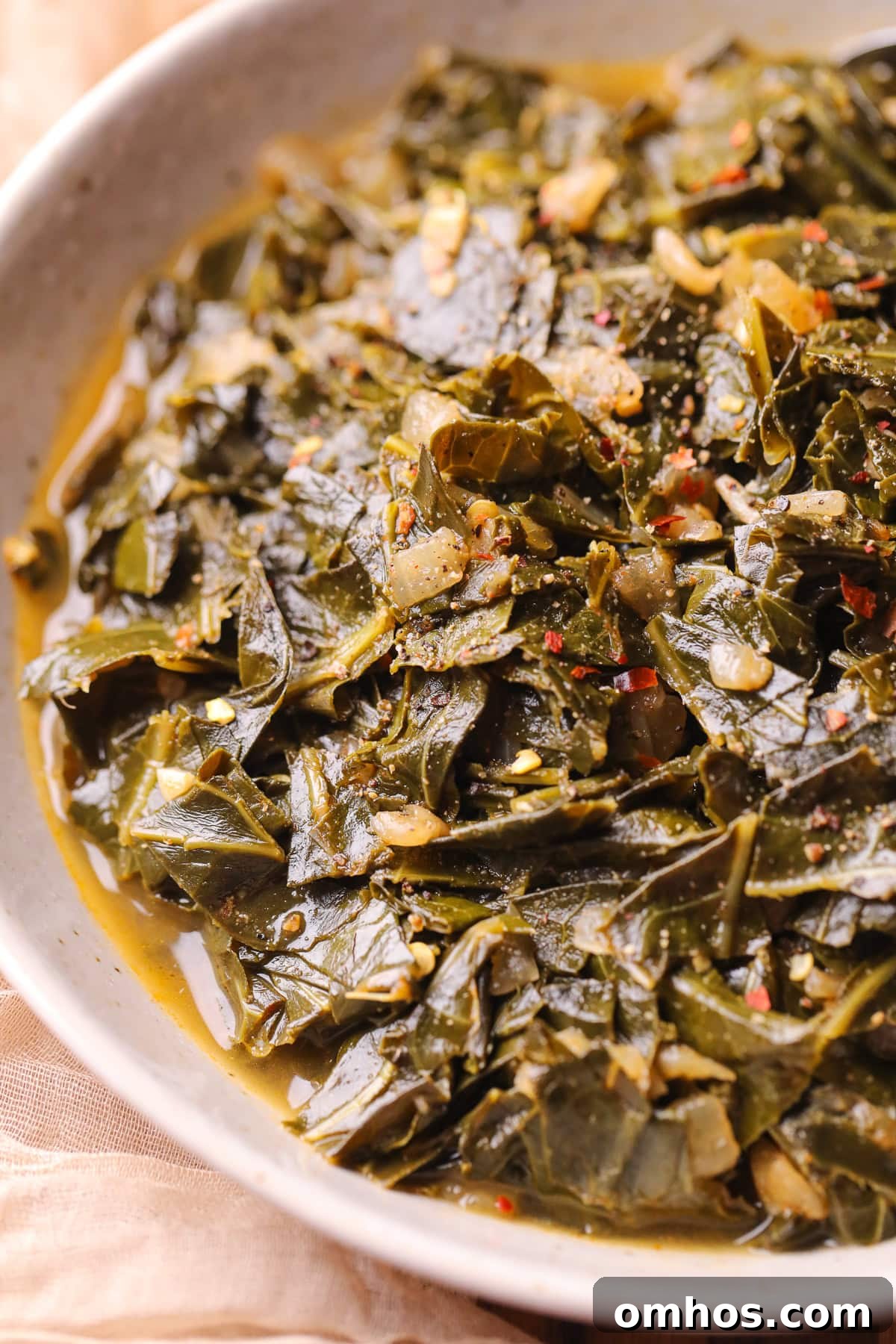 Vegan Southern Collard Greens Recipe 8 Vegan southern collard greens in a white bowl.