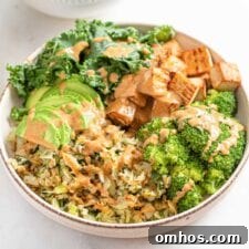 Low-carb vegan dinner bowl with tofu, cabbage, kale and avocado.