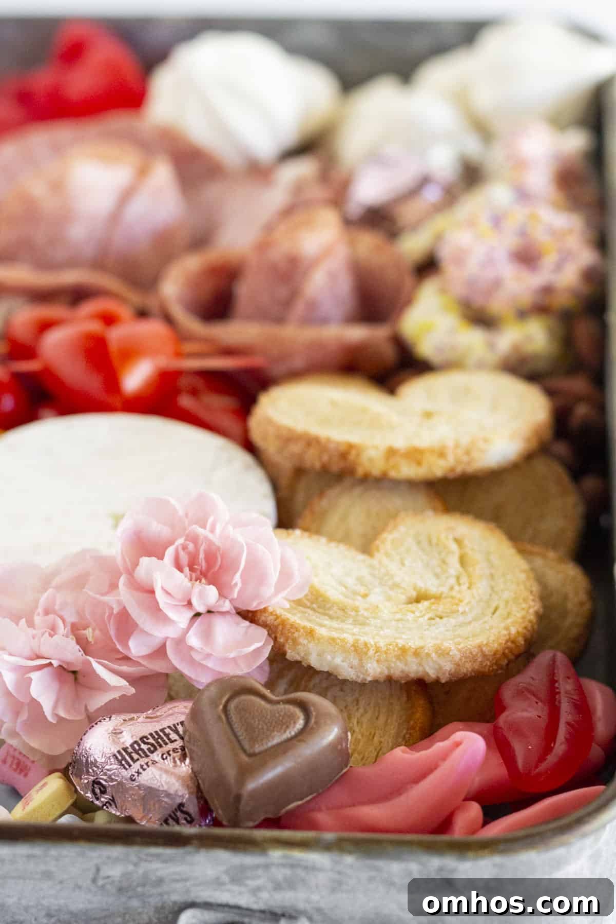 A close up of a Valentine's day Charcuterie Board.