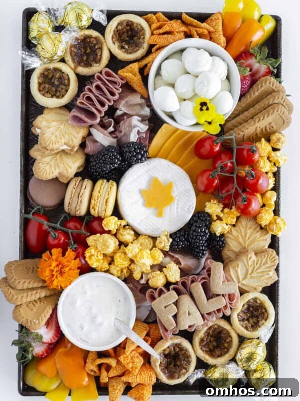 A fall charcuterie board on a galvanized tray.