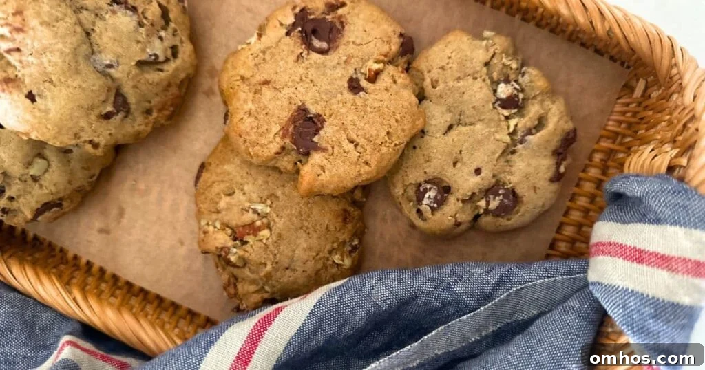 Spiced pecan sourdough cookies displayed on a rattan tray.