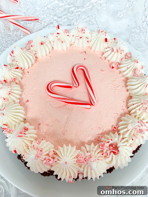 Candy Cane Peppermint Fluff Pie Recipe 3 Peppermint fluff pie, easy best peppermint pie, Peppermint no bake Christmas pie, 6 ingredient peppermint pie, easy to make 10 minute pie, best easy Christmas frozen peppermint pie, candy cane pie, best easy candy cane peppermint pie