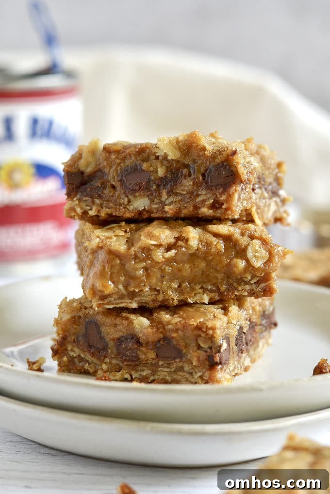 stack of three pumpkin caramel bars on a plate