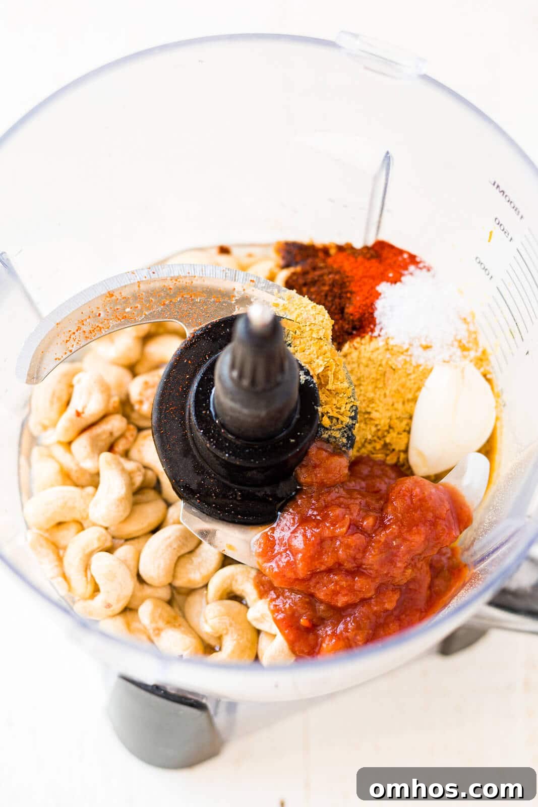 ingredients for cashew queso in the food processor before blending