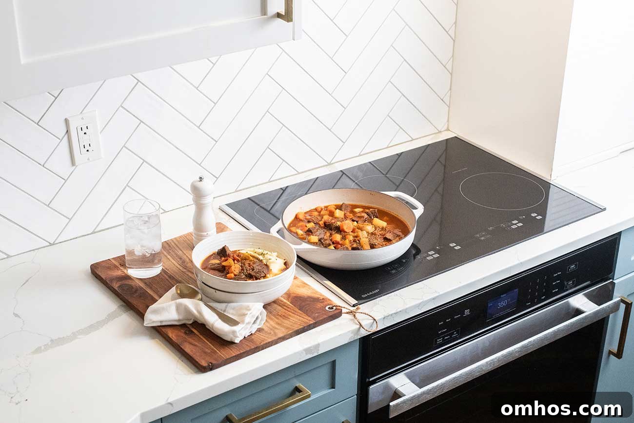 Moroccan Beef Tagine Recipe: Spiced Slow-Cooked Stew 3 A pot of beef tagine sitting on the Sharp Induction Cooktop.