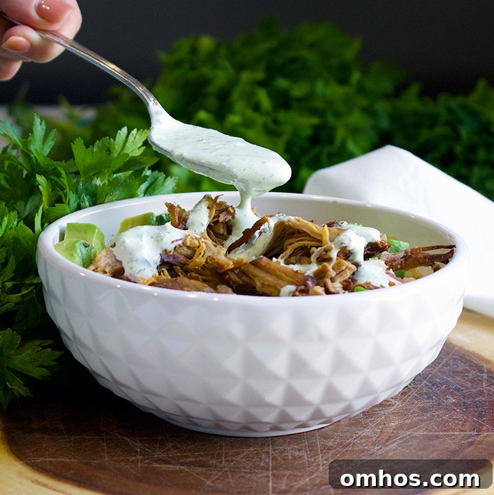 Vegetarian Quinoa Carnitas Bowl Recipe 4 Drizzling Jalapeño Cream on Quinoa Veggie Carnitas Bowls