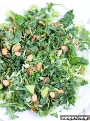 A salad on a white plate.