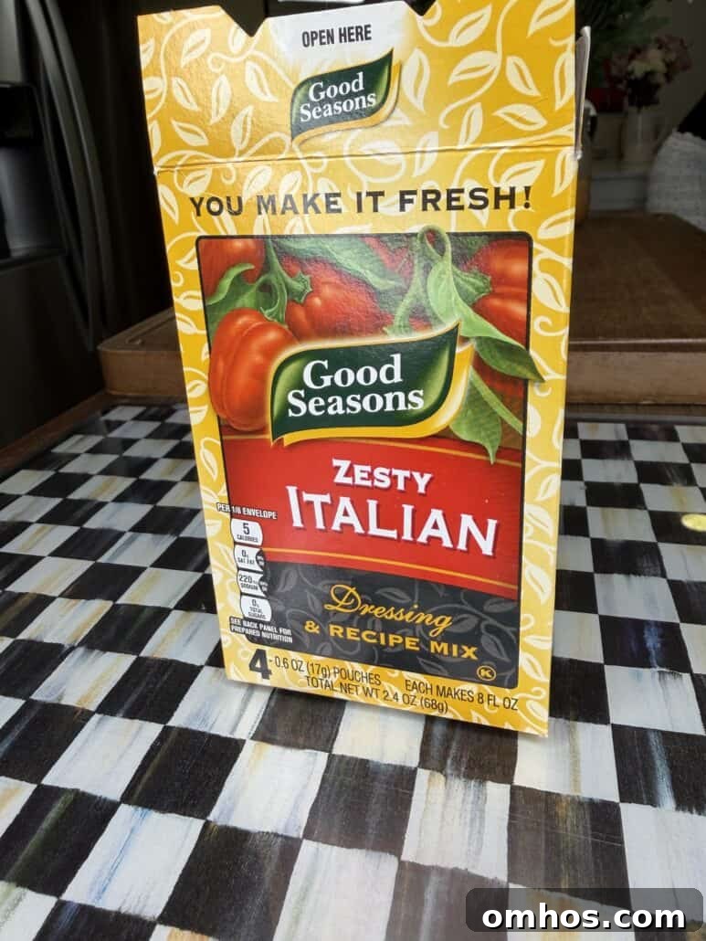 A box of Zesty Italian dressing mix on a table.