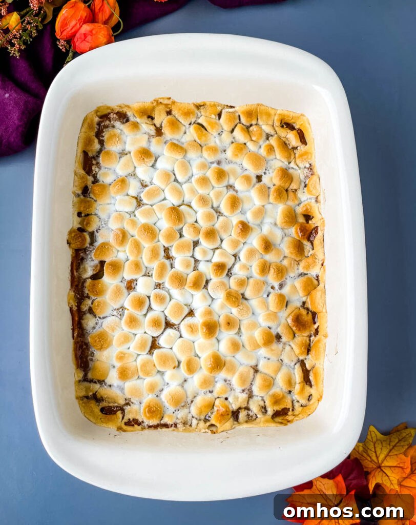 Southern Sweet Potato Casserole with Pecan Streusel 7 sweet potato casserole with marshmallows in a red baking dish